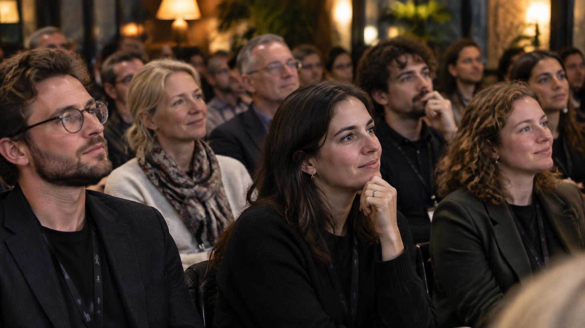 Audience at an event listening to a talk
