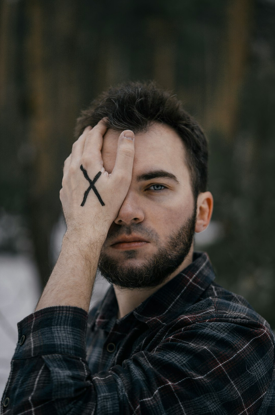 Portrait of a bearded man in a casual shirt